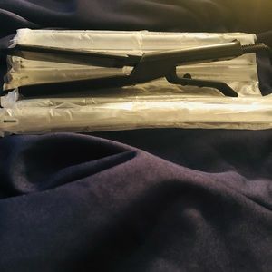 Flat irons silk press never been used.